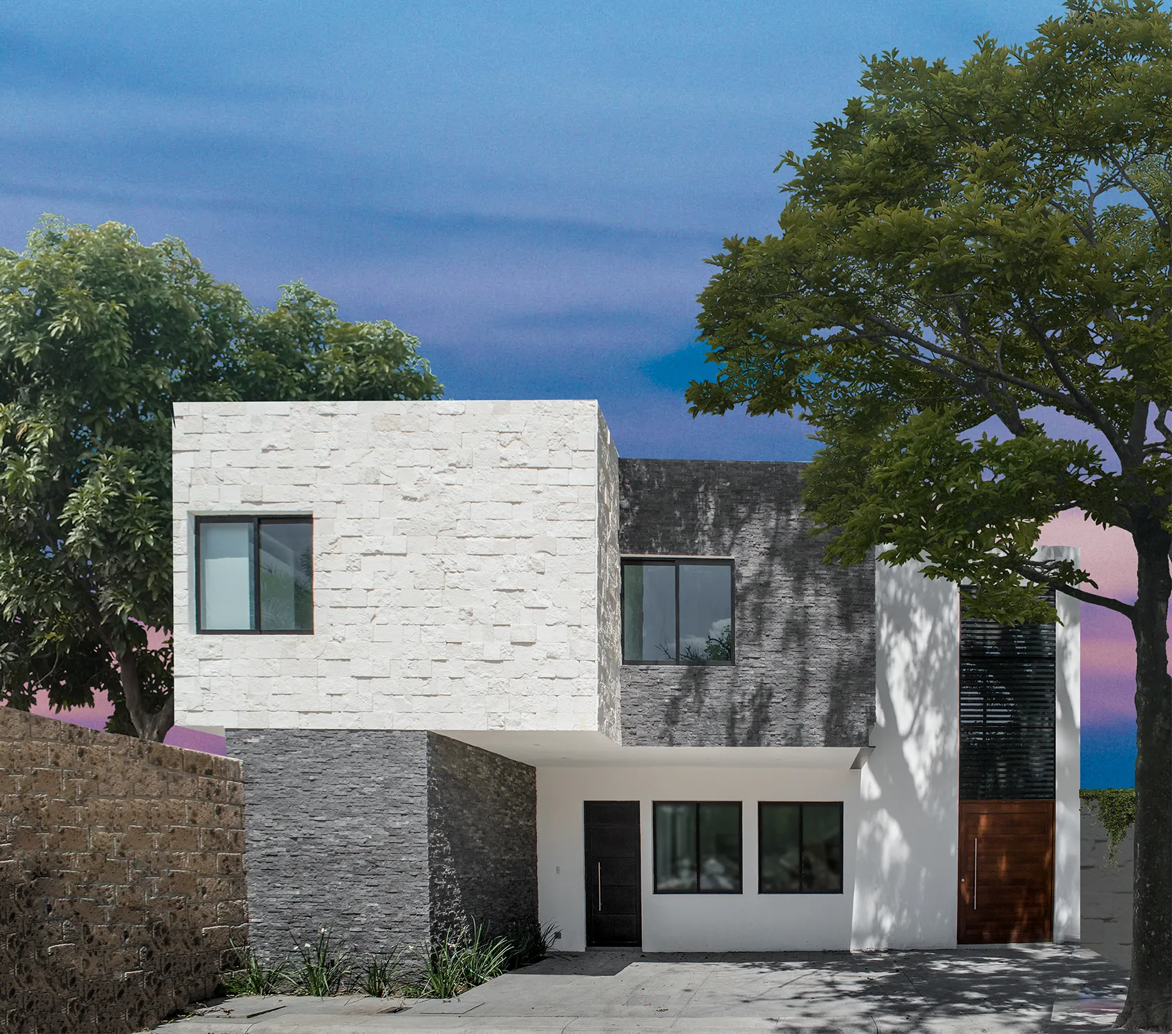 Portada vertical del proyecto 'Loft Chandler' por Arquitectos Ejecutivos: fachada moderna destacando el contraste entre volúmenes de piedra blanca y negra.